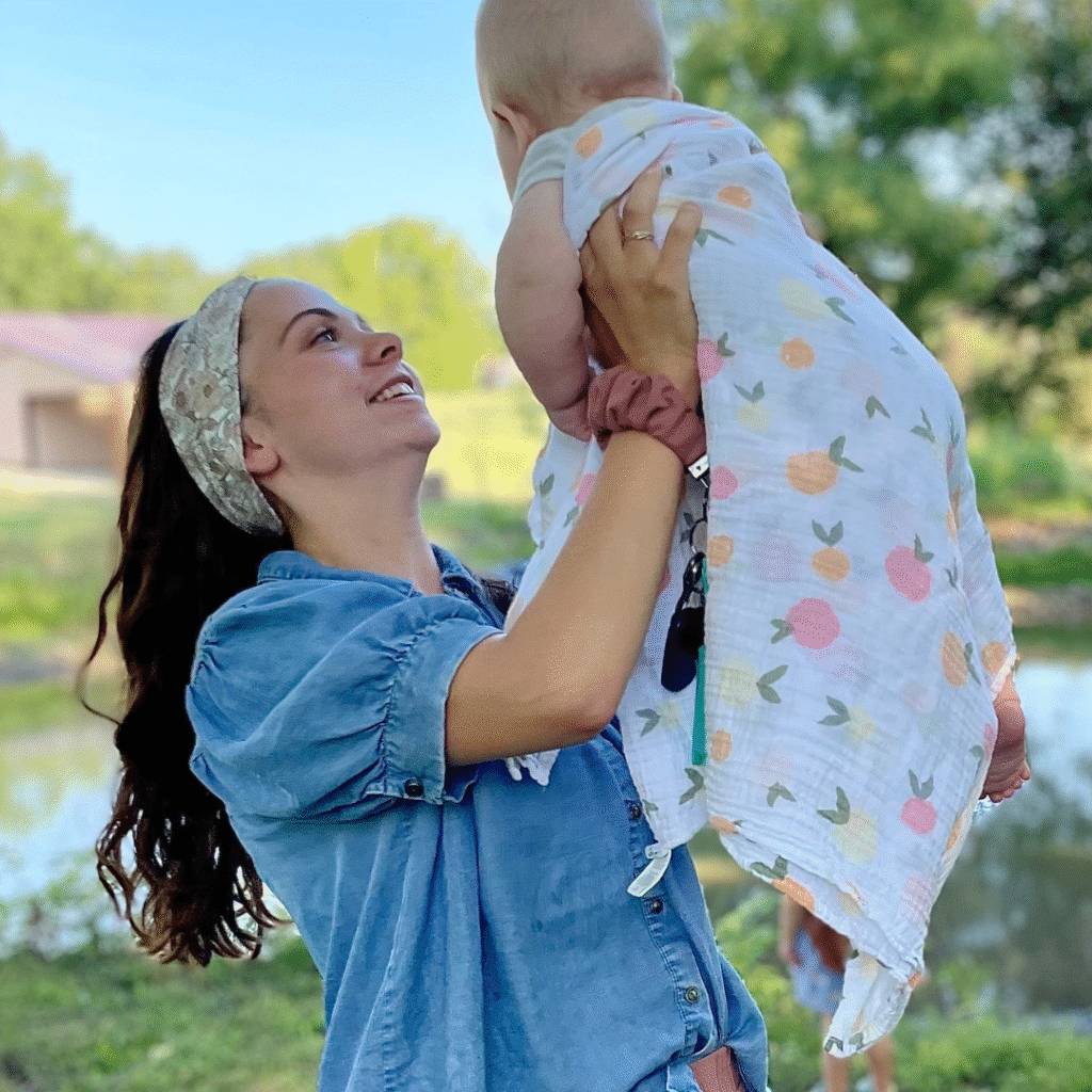 BT Holding Winnie in blanket square