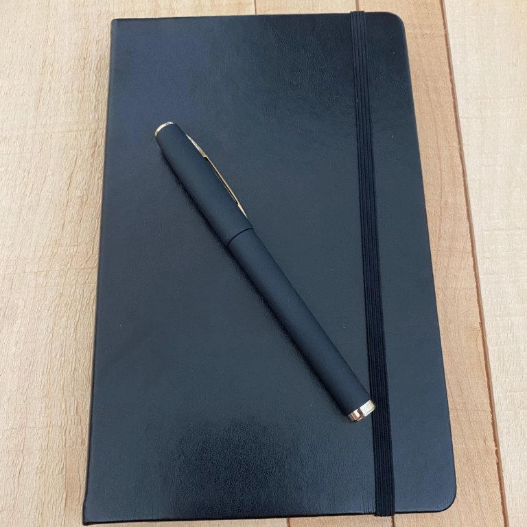 Journal and Pen lying down square